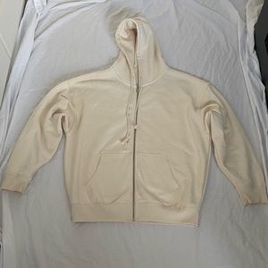 Brandy Melville Brand New Cream colored zip up hoodie